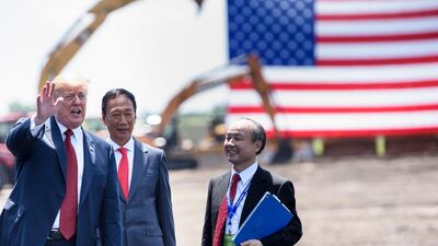 US President Donald Trump (L) stands with Foxconn Chairman Terry Gou (C), and Masayoshi Son, Chief Executive Officer of SoftBank. Japanese conglomerate, SoftBank, is a driving force behind the VC fundraising frenzy. Photo: AFP