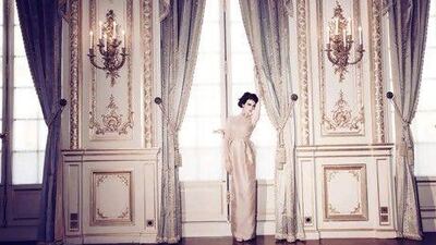 Dior Dress; shoes, both Christian Dior Couture. Earrings, Jean-Paul Gaultier Couture. Bracelet, Boucheron.