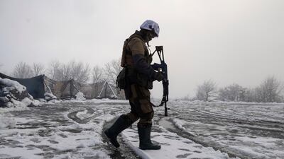 A Ukrainian soldier at the line of separation from pro-Russian rebels in Ukraine's Donetsk region. AP