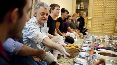 Expats attend their first Iftar at a home in Al Rams, Ras Al Khaimah. (Razan Alzayani / The National)