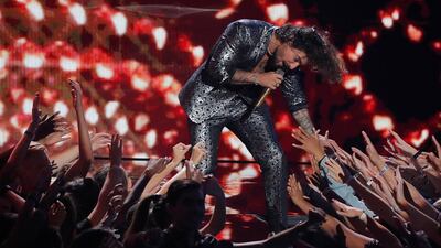 Maluma performs 'Felices los 4.' Reuters