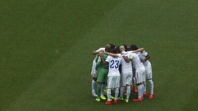 USA players huddle before their match against Thursday at the 2014 World Cup in Recife, Brazil. Ruben Sprich / Reuters