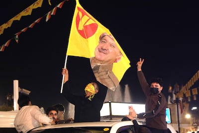 Supporters of the Kurdistan Democratic Party celebrate in Erbil, in the semi-autonomous Kurdistan region. AFP