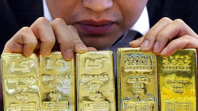 July was the third consecutive month of outflows from global gold exchange-traded funds. EPA
