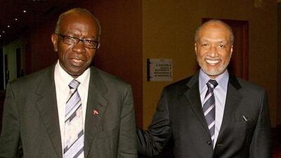 Jack Warner, left, who resigned from Fifa in 2012 following an investigation that found him to have committed fraud, is alleged to have received Dh4.4m from a company owned by Mohamed Bin Hammam, right, according to The Telegraph. Shirley Bahadur / AP Photo