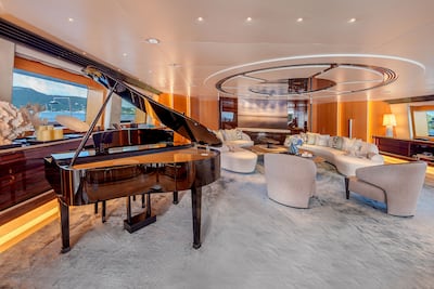 A six-month refit softened the yacht’s interiors with warm woods, neutral tones and tactile fabrics. Photo: Jumeirah