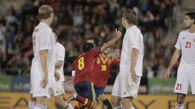 Spain 2-1 Belarus. Xavi scored in the 61st minute and Alvaro Negredo scored in the 78th to bring the world champions within a point of qualification. Manu Mielniezuk / AP