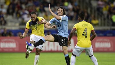 Edinson Cavani of Uruguay fights for the ball with Arturo Mina of Ecuador during the Copa America Brazil 2019 group C match between Uruguay and Ecuador at Mineirao Stadium in Belo Horizonte, Brazil. Getty Images