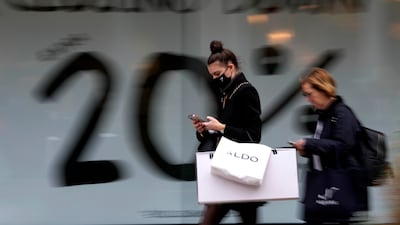 Shoppers walk along Oxford Street in London. The supply chain crisis is far from over, experts say. Photo: AP