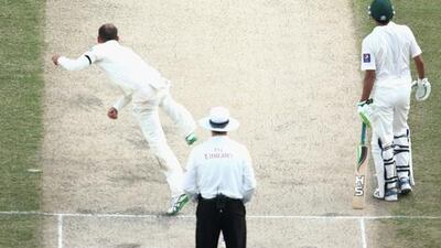 Misbah-ul-Haq of Pakistan faces a ball from Nathan Lyon of Australia during Day 1 of the first Test between Pakistan and Australia in Dubai on Wednesday. Warren Little / Getty Images