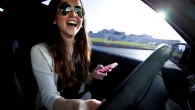 Jordanian Hana Yazbek, 25, drives through the streets of Abu Dhabi. Hana, a driver for eight years, believes that women need to be more decisive when it comes to dealing with traffic.