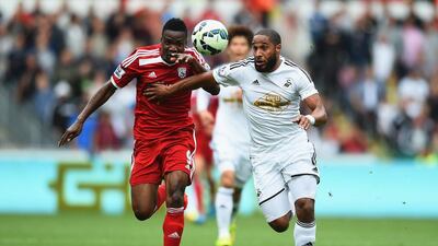 Ashley Williams of Swansea City battles with Brown Ideye of West Brom during their Premier League match, which Swansea won 3-1, on Saturday. Christopher Lee / Getty Images