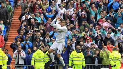Real Madrid’s Portuguese forward Cristiano Ronaldo celebrates after scoring his first goal against Valencia CF during their La Liga match at the Santiago Bernabeu Stadium, in Madrid, Spain, 08 May 2016. Real Madrid won 3-2. Victor Lerena / EPA