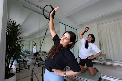 Chandini Guria, left, and her sister Chanchal aspire to become financially independent. Chris Whiteoak / The National