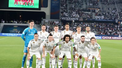 The Real Madrid team line up before the game.