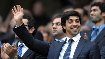 In this file photo taken on August 23, 2010 Manchester city owner Sheikh Mansour bin Zayed waves during the Premier League match against Liverpool. AFP