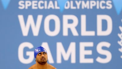 An athlete waits to compete in the 50m Breaststroke during the swimming at the Special Olympics at Hamdan Sports Complex, Dubai. All Photos by Chris Whiteoak / The National