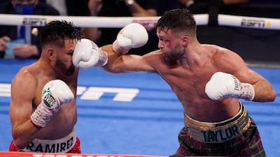 Josh Taylor hits Jose Ramirez. AP