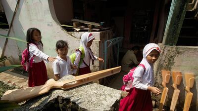 Gunstocks laid out to cure outside an small air-rifle factory in Cipacing, Indonesia. Ed Wray / Getty Images
