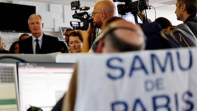 France's newly appointed Prime Minister, Michel Barnier, visits a hospital in Paris on Saturday. AFP