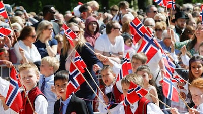 Children during a parade on the National Day in Oslo, Norway on May 17, 2016. Norway was declared the top country in the World Happiness Report 2017 released on March 20, 2017. NTB Scanpix/Terje Pedersen/via Reuters