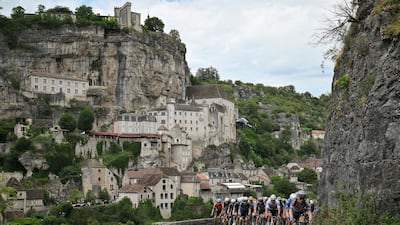 The peloton rides past the town of Rocamadour during Stage 12 of the Tour de France. AFP