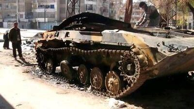 Calls have been made for temporary ceasefires and, or, military intervention to allow the safe passage of aid workers in Syria as evidence of fierce fighting, such as this burnt-out armoured vehicle in Homs, grows across several areas of Syria.
