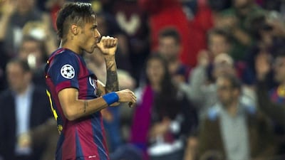 Barcelona's Neymar celebrates scoring the opener in their 2-0 win over Paris Saint-Germain in the Champions League quarter-final second leg on Tuesday at Camp Nou. Barca advanced to the semi-finals 5-1 on aggregate. Alejandro Garcia / EPA