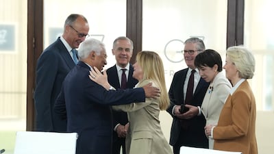 From left, German Chancellor Friedrich Merz, European Council President Antonio Costa, Canadian Prime Minister Mark Carney, Italian Prime Minister Giorgia Meloni, British Prime Minister Keir Starmer, Japan's Prime Minister Sanae Takaichi and European Commission President Ursula von der Leyen at the G7 summit in Evian-les-Bains, France, yesterday. EPA
