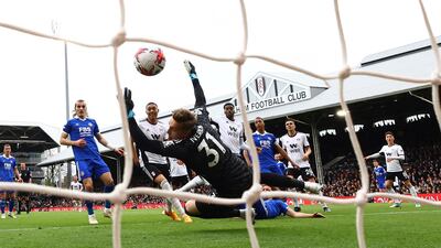 Leicester City goalkeeper Daniel Iversen is beaten by Willian's strike for Fulham's first goal. Reuters