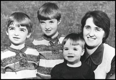 From left, Noel, eldest brother Paul, Liam and their mother, Peggy, in a family picture taken in the 1970s Getty
