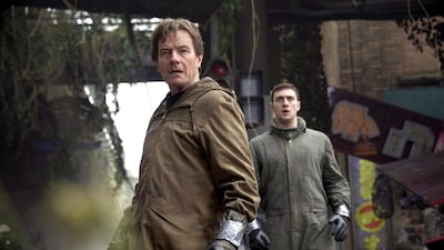 Bryan Cranston and Aaron Taylor-Johnson in a scene from Godzilla. Courtesy Warner Bros