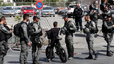 Israeli border police block a road into Sheikh Jarrah. EPA