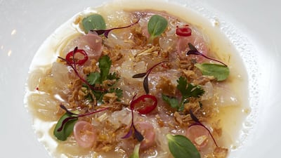 Sea bream carpaccio at Indochine. Photo: Antonie Robertson / The National