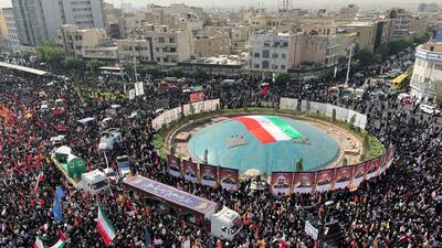 Iranians gather for the funeral of military commanders and scientists killed in Israeli air strikes, in Tehran. EPA