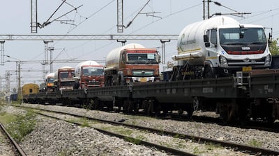 Oxygen tankers are seen on a special train 'Oxygen Express' upon their arrival at a station amidst rising Covid-19 coronavirus cases, in Hyderabad. AFP