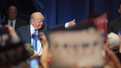 Republican presidential candidate Donald Trump arrives for a campaign rally at the KI Convention Center in Green Bay, Wisconsin on October 17. Scott Olson / Getty Images / AFP.