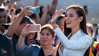 Miss Universe 2018 Catriona Gray of the Philippines waves as she arrives at the Manila International airport. AFP