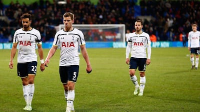 Nacer Chadli, Jan Vertonghen and Roberto Soldado of Tottenham Hotspur leave the pitch after their Premier League loss to Crystal Palace on Saturday. Julian Finney / Getty Images / January 10, 2015