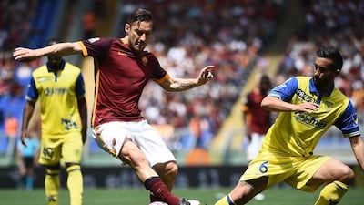 Francesco Totti, left, will be in the Roma team to take on Cairo giants Al Ahly at Al Ain's Hazza bin Zayed Stadium. Filippo Monteforte / AFP
