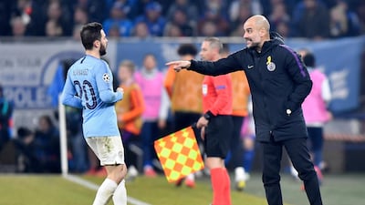 Manchester City manager Pep Guardiola, right, is proud of the way his side bounced back to win 3-2. Martin Meissner / AP Photo