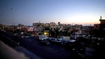 Houses in darkness during an electricity cut in Beirut's southern suburb of Ouzai, Some areas face power cuts of up to 12 hours every day for anyone without access to a generator to pick up the slack. Grace Kassab / AP Photo