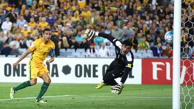Australia's Tim Cahill scores the equalising goal. Cameron Spencer / Getty Images
