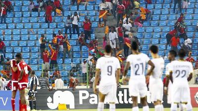Equatorial Guinea fans react as a police helicopter hovers above the stand during the 2015 African Cup of Nations semi-final soccer match against Ghana in Malabo, February 5, 2015. Violent scenes overshadowed the African Nations Cup semi-final as Ghana reached Sunday?s final with a 3-0 win over hosts Equatorial Guinea on Thursday in a match halted for 34 minutes late in the second half. REUTERS/Amr Abdallah Dalsh