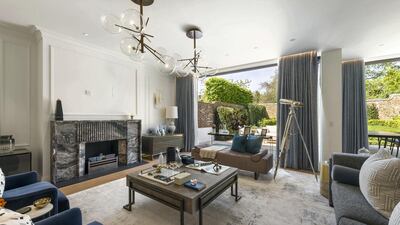 The formal reception space provides a wealth of natural light from the 3m floor-to-ceiling windows and opens directly onto the landscaped garden and terrace. Courtesy Knight Frank