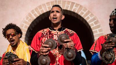 A Gnawa traditional group performs in the city of Essaouira to celebrate the decision to add the Gnawa culture to Unesco's list of Intangible Cultural Heritage of Humanity. AFP