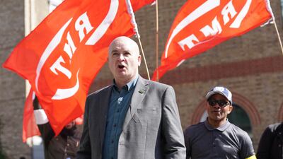 Mick Lynch on a picket line outside King's Cross St Pancras station in London.