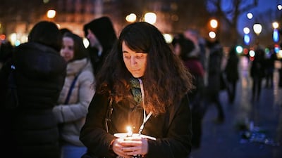 A candlelit vigil was held in Paris on January 9 in memory of the 12 victims of the country's recent terrorist attacks. Jeff J Mitchell/Getty Images
