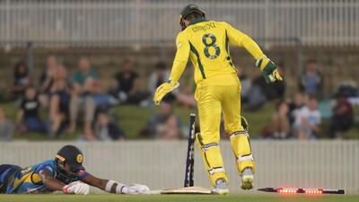 Sri Lanka's Wanindu Hasaranga is run out during the warm-up match in Canberra. Getty Images