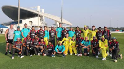 The UAE and Australia teams at the end of the match a T20 international at Zayed cricket stadium oval, Abu Dhabi.